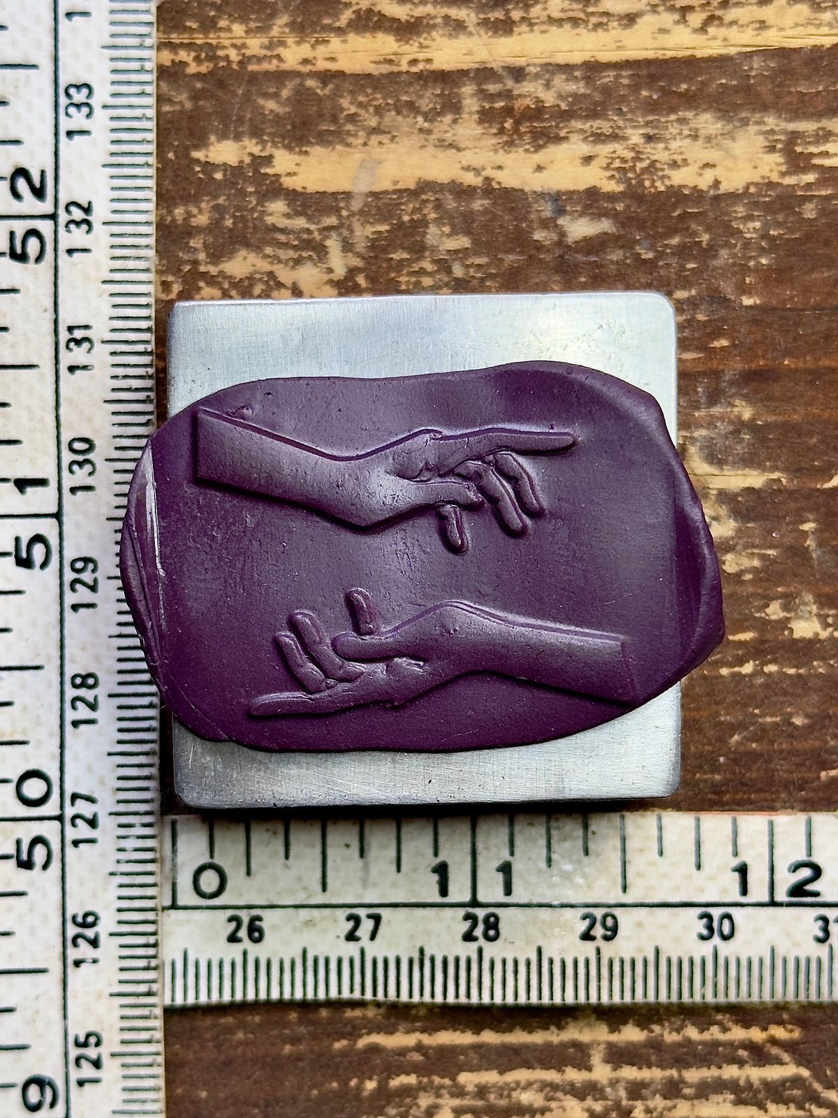 Magic hands steel impression die