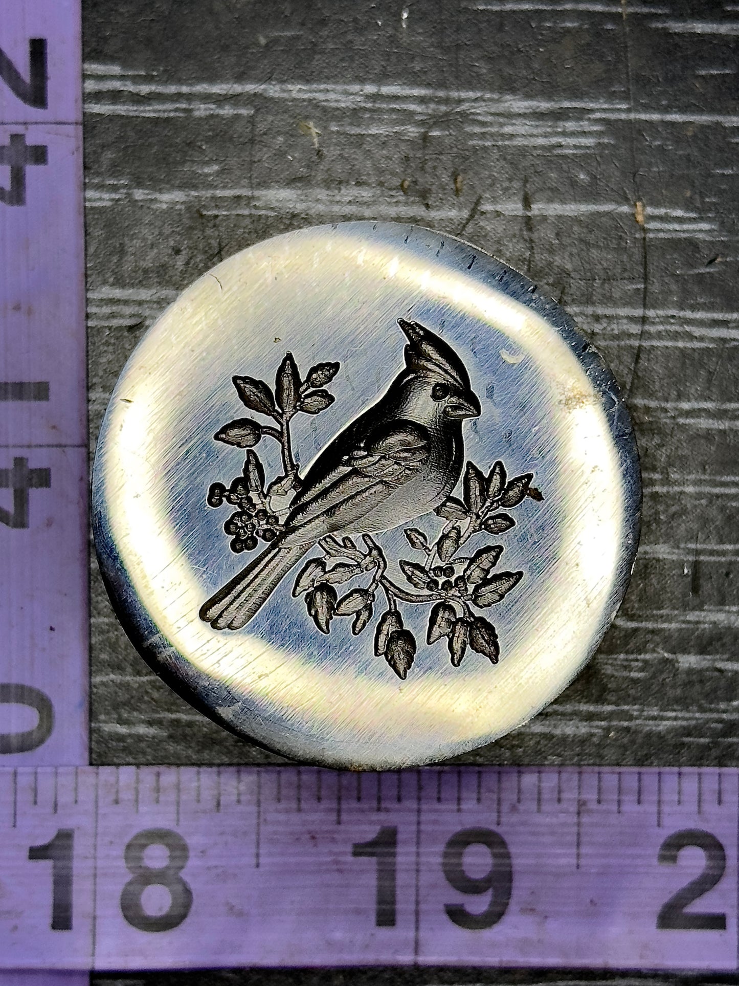 The Red Cardinal steel impression die