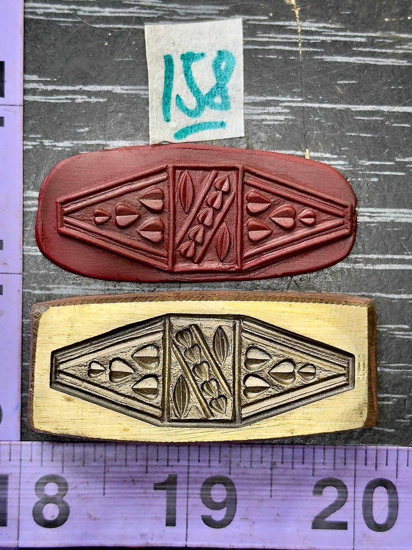Spectacular bronze impression die #158