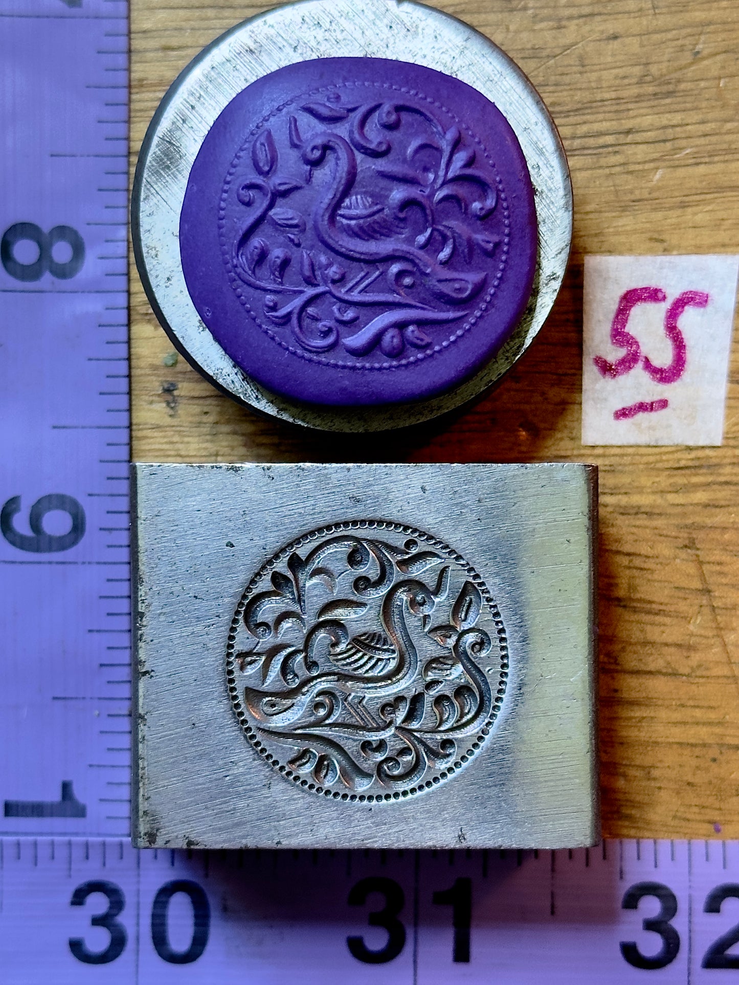 Peacock left facing steel impression die 55