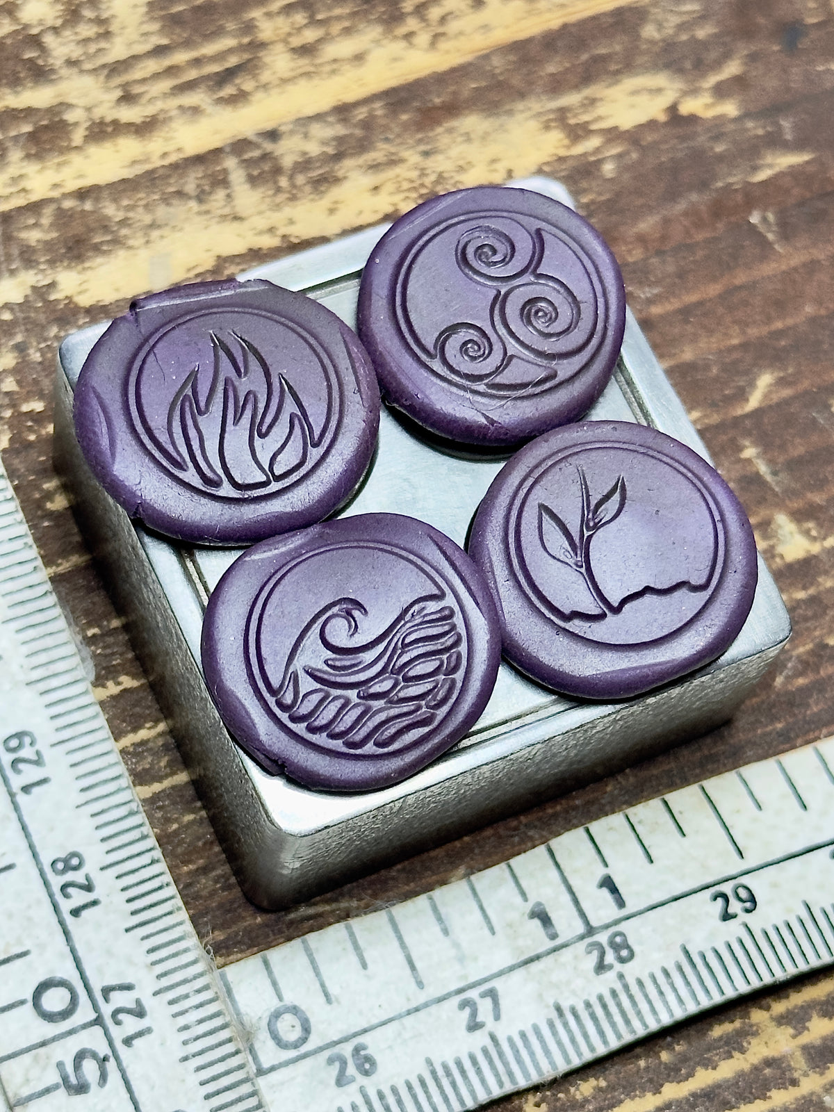The four elements buttons steel impression die
