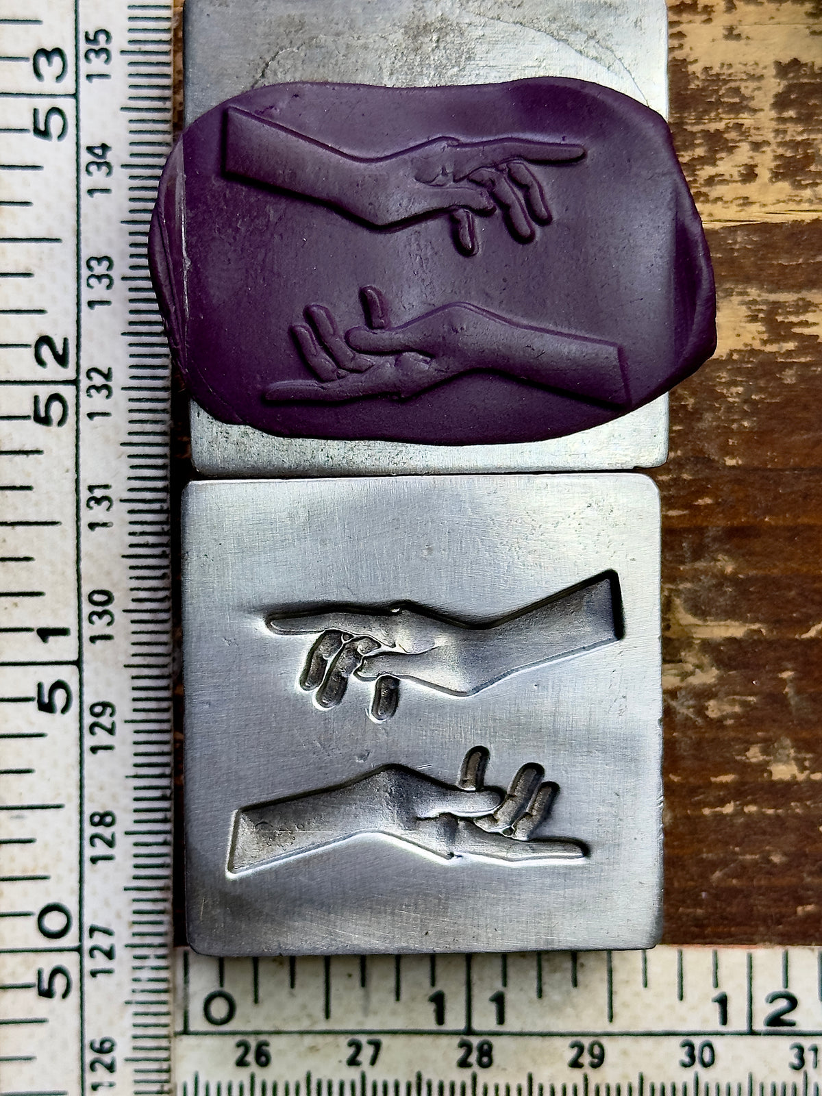 Magic hands steel impression die