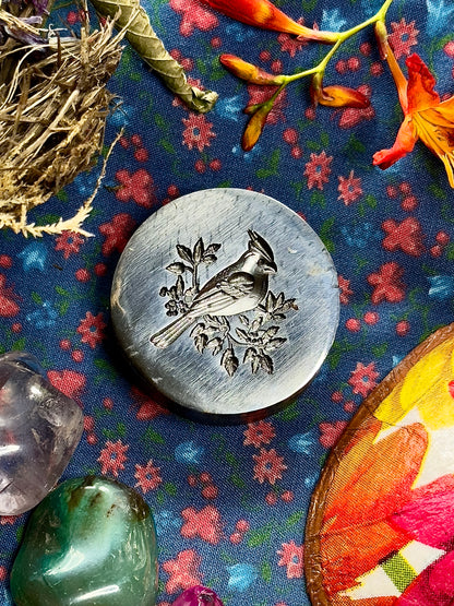 The Red Cardinal steel impression die