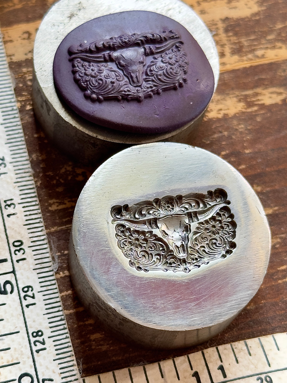SW style longhorn with tooled leather background steel impression die
