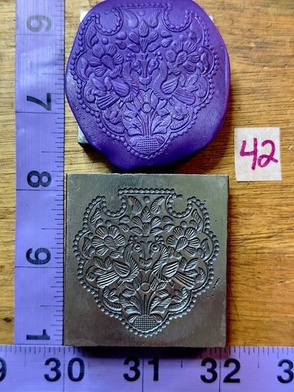 Mirrored peacocks amulet steel impression die 42