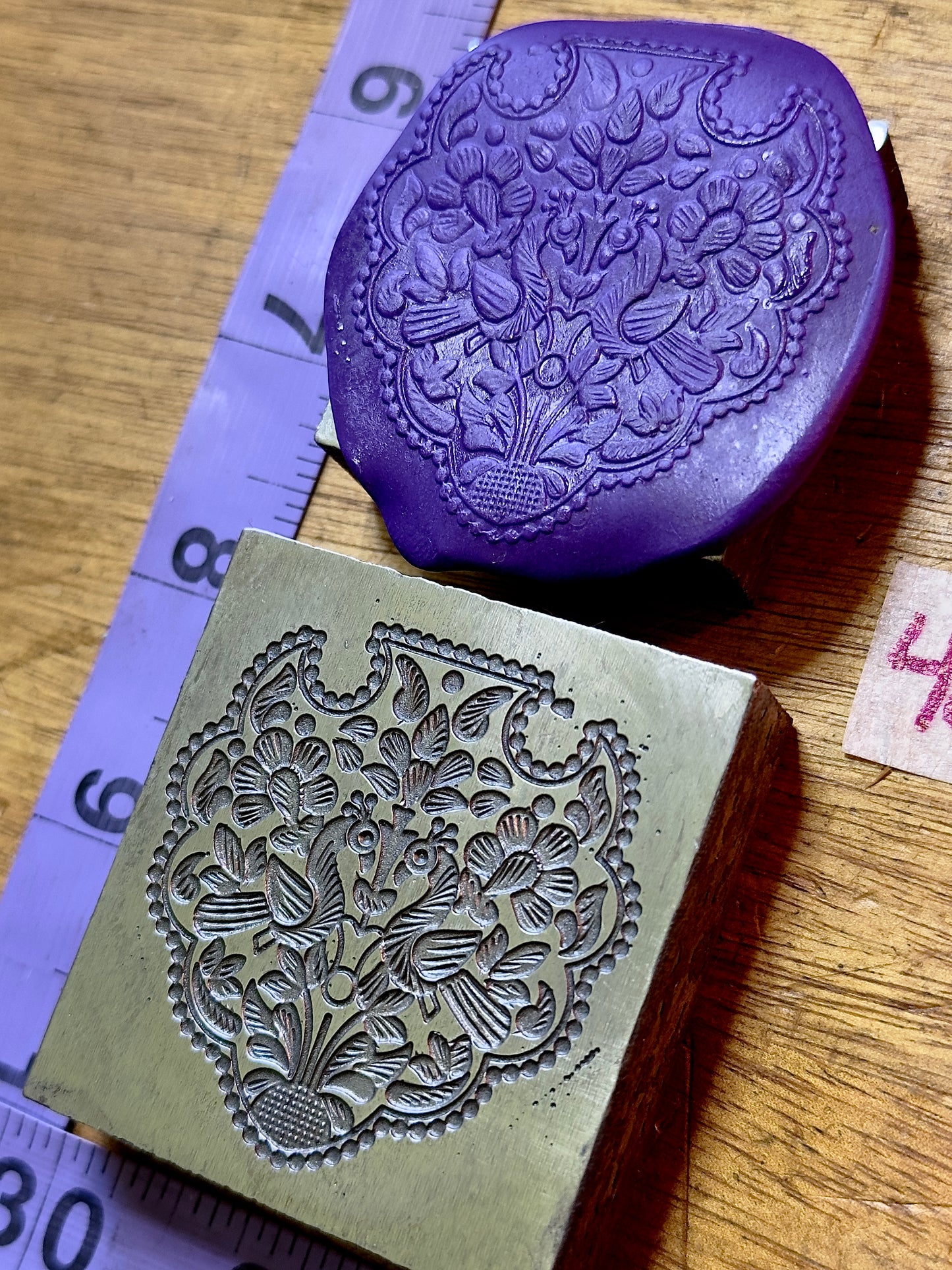 Mirrored peacocks amulet steel impression die 42