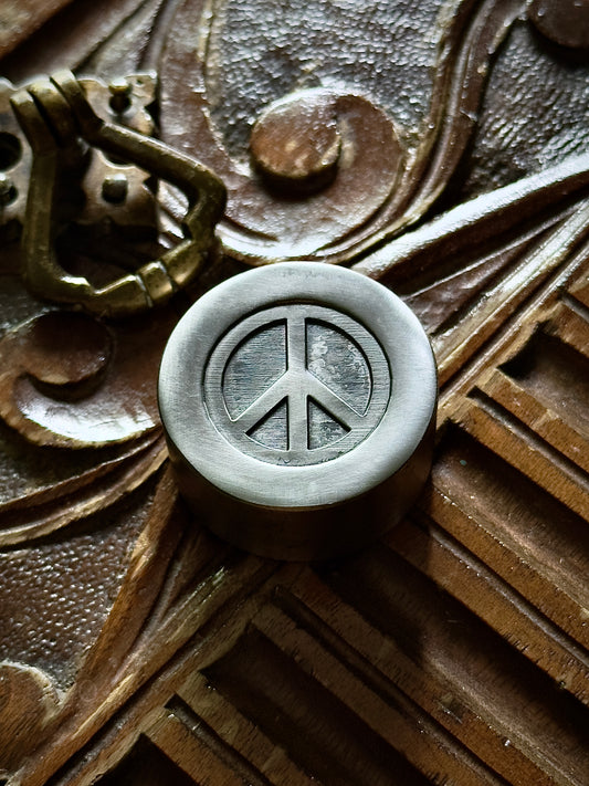 Peace symbol impression die