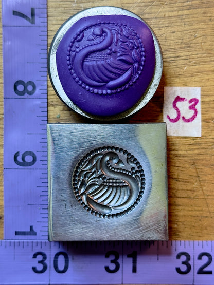 Peacock left facing steel impression die 53