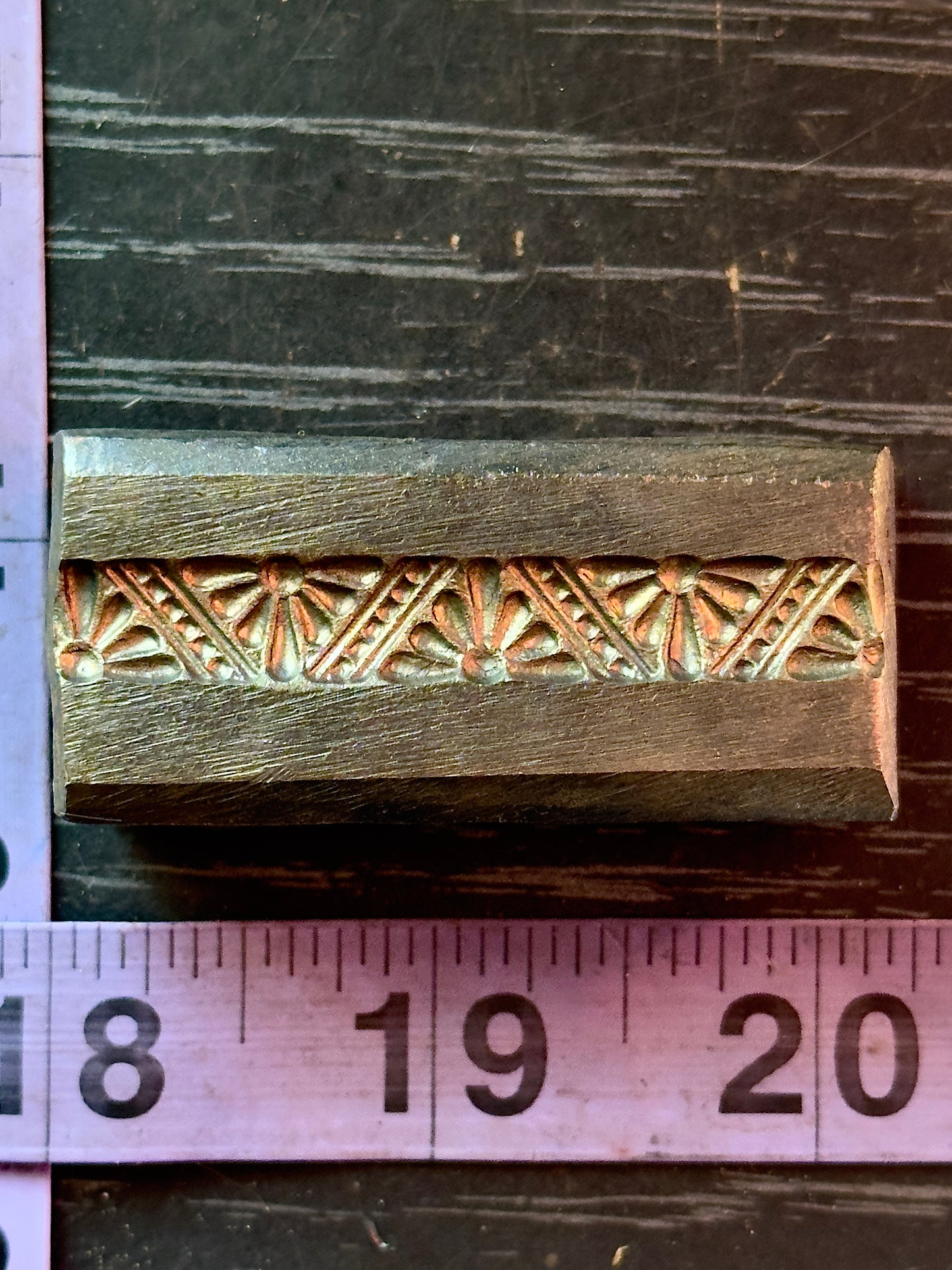 Art deco style sun ray triangles Single wire die steel impression