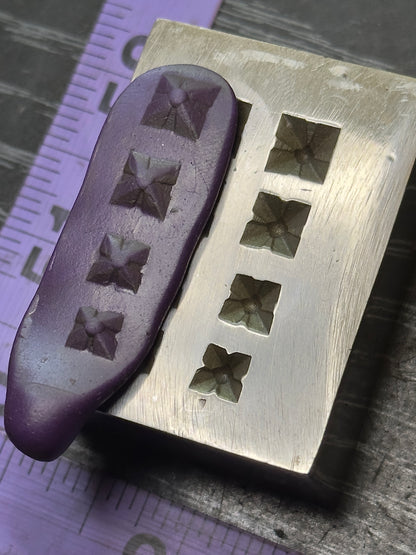 Pyramid style with four fluted points vintage steel shot plate