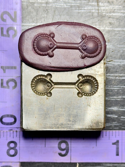 The Bell Maker steel impression die