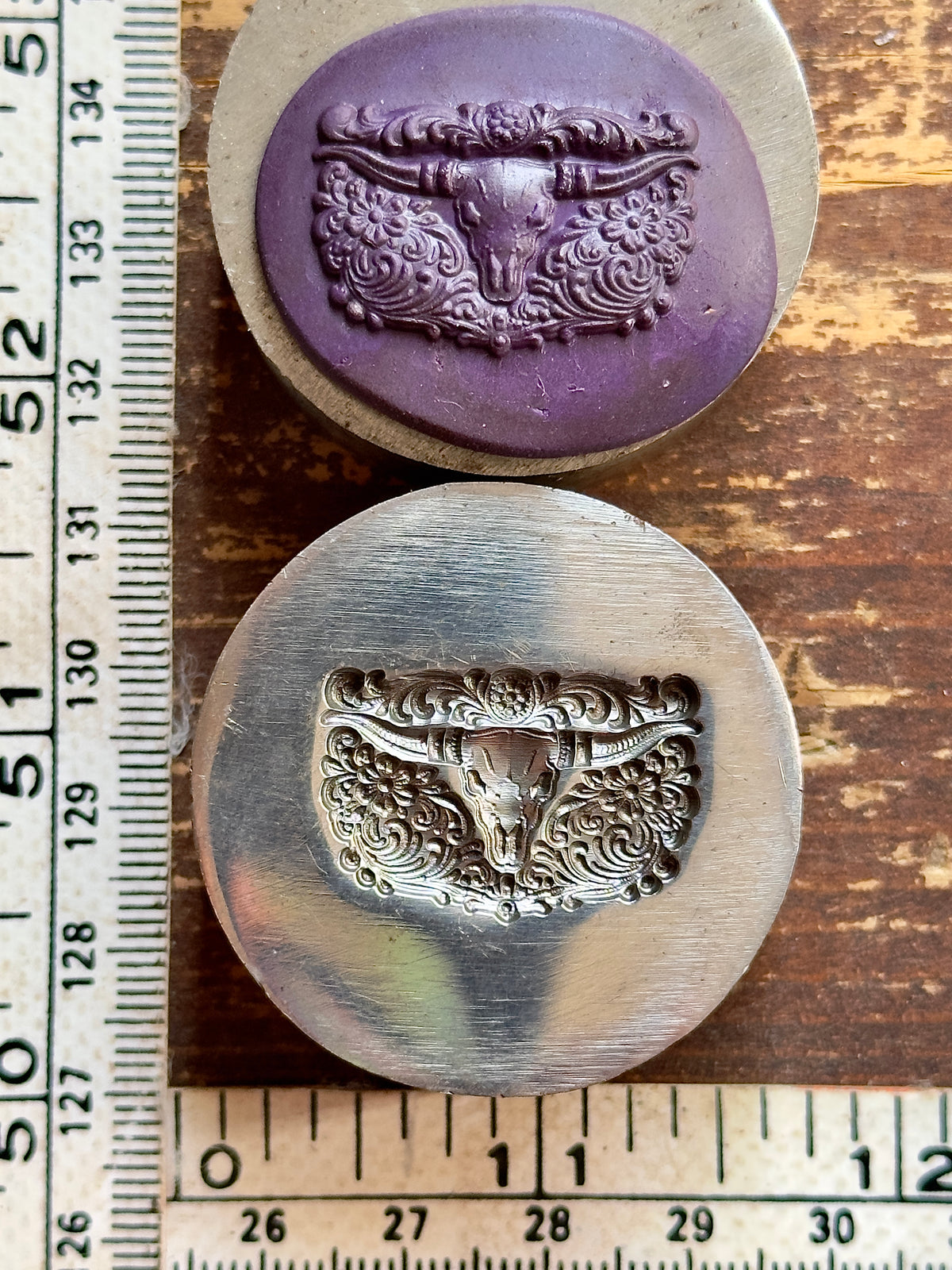 SW style longhorn with tooled leather background steel impression die