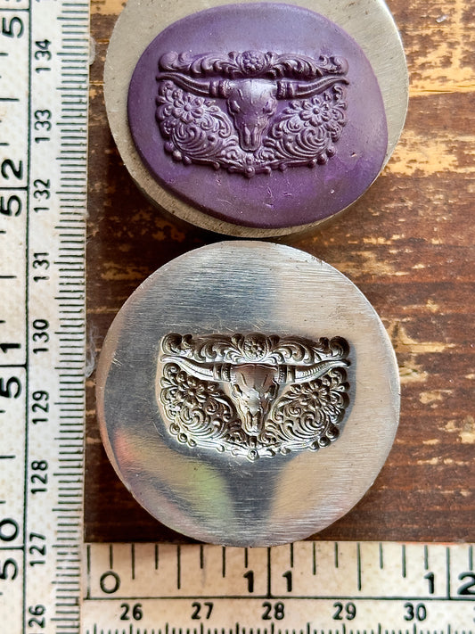SW style longhorn with tooled leather background steel impression die