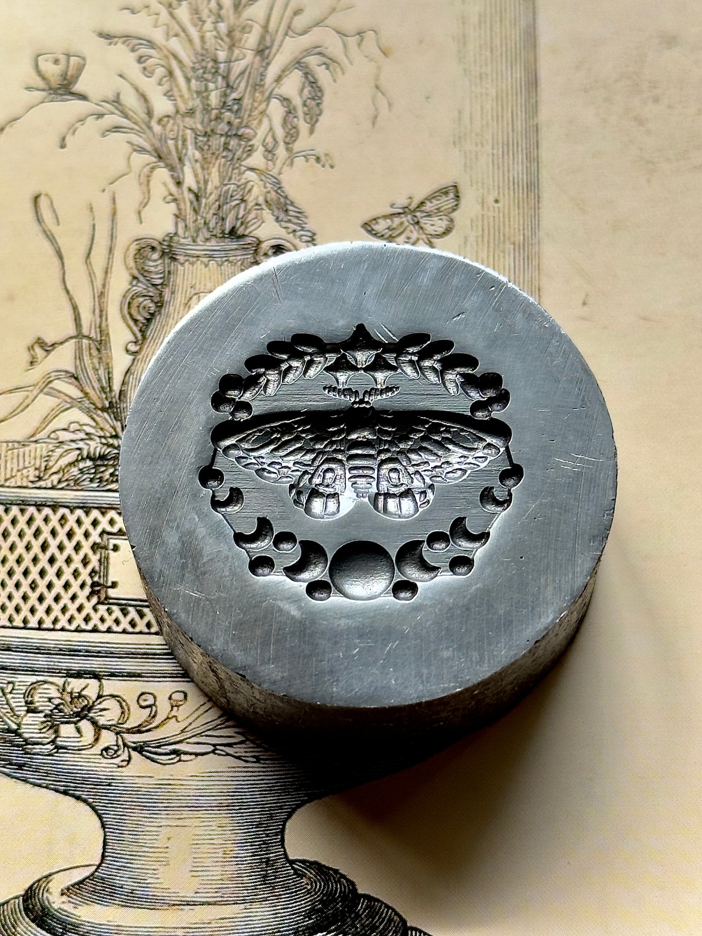 Moth and moon phase impression steel die