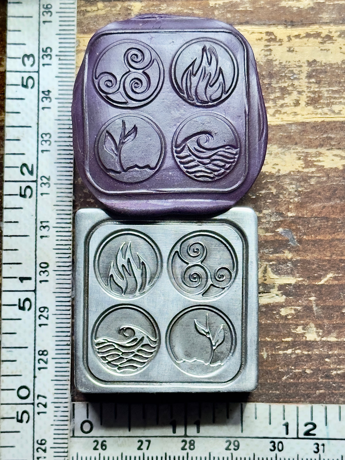 The four elements buttons steel impression die