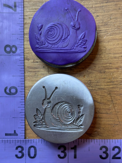 Snail impression die