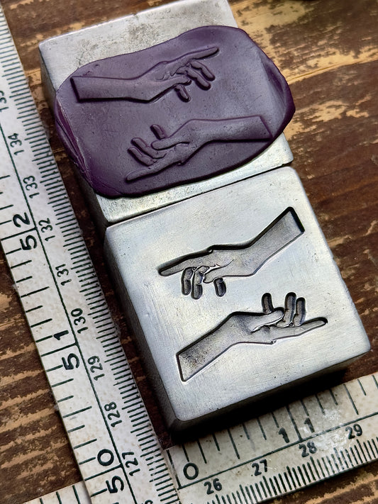 Magic hands steel impression die