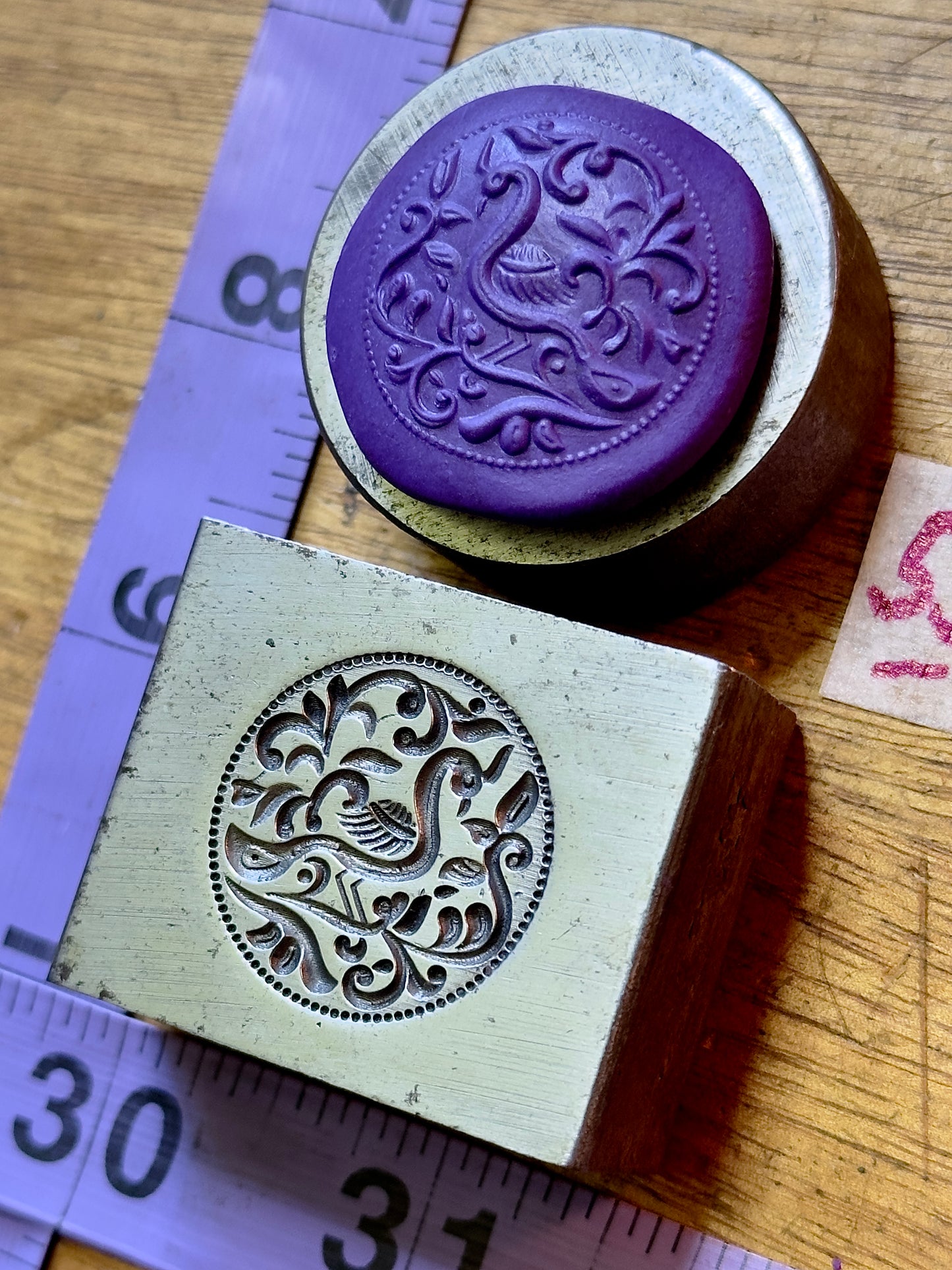 Peacock left facing steel impression die 55