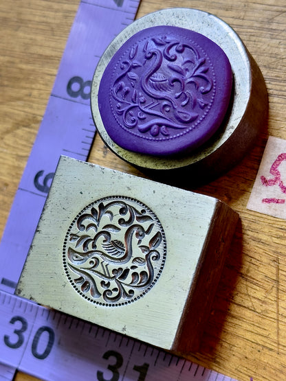 Peacock left facing steel impression die 55