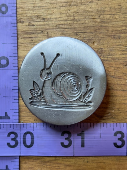 Snail impression die