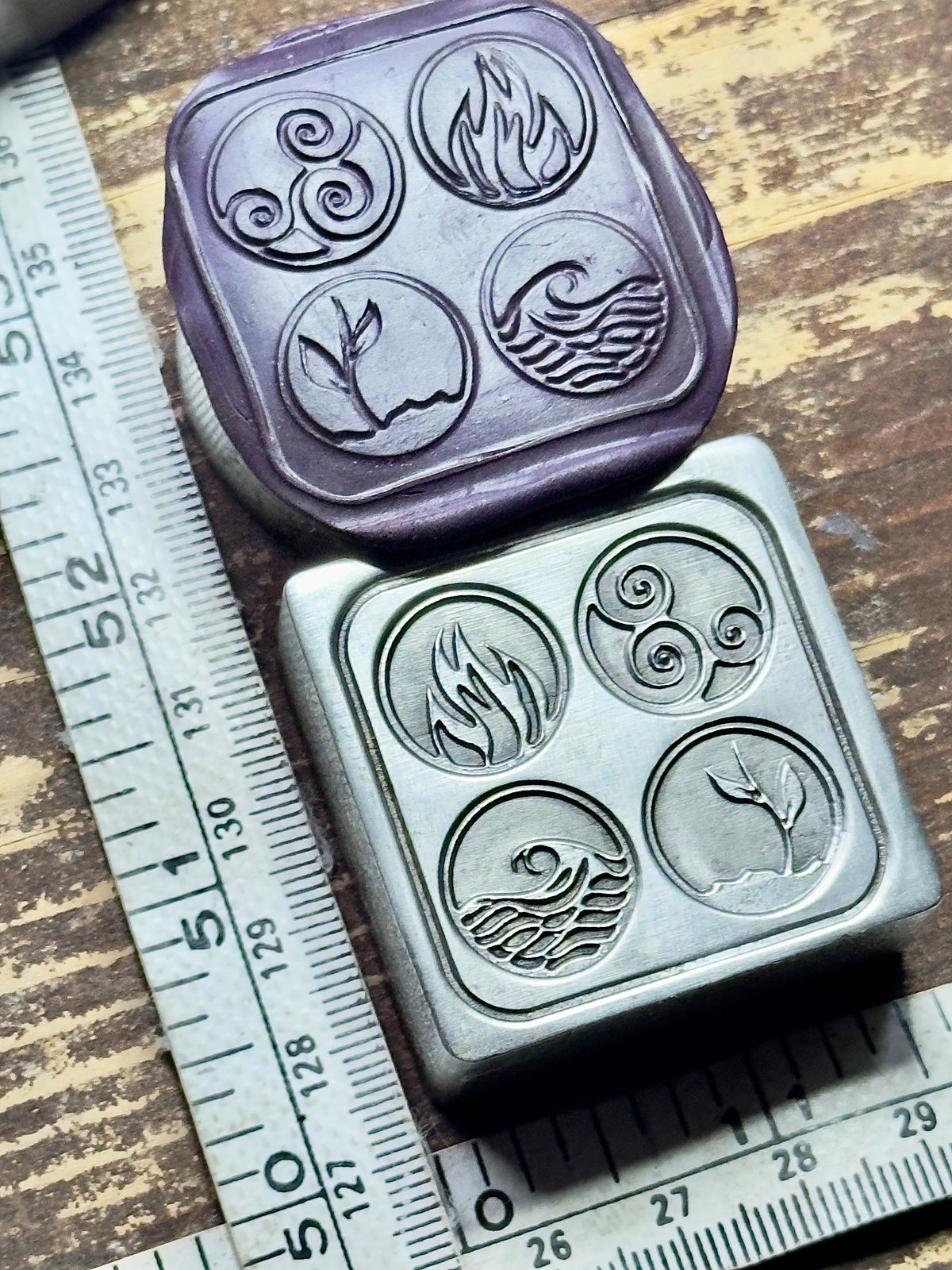 The four elements buttons steel impression die