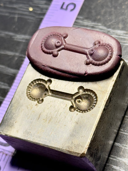 The Bell Maker steel impression die