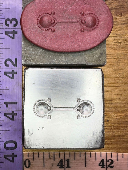 The Bell Maker steel impression die