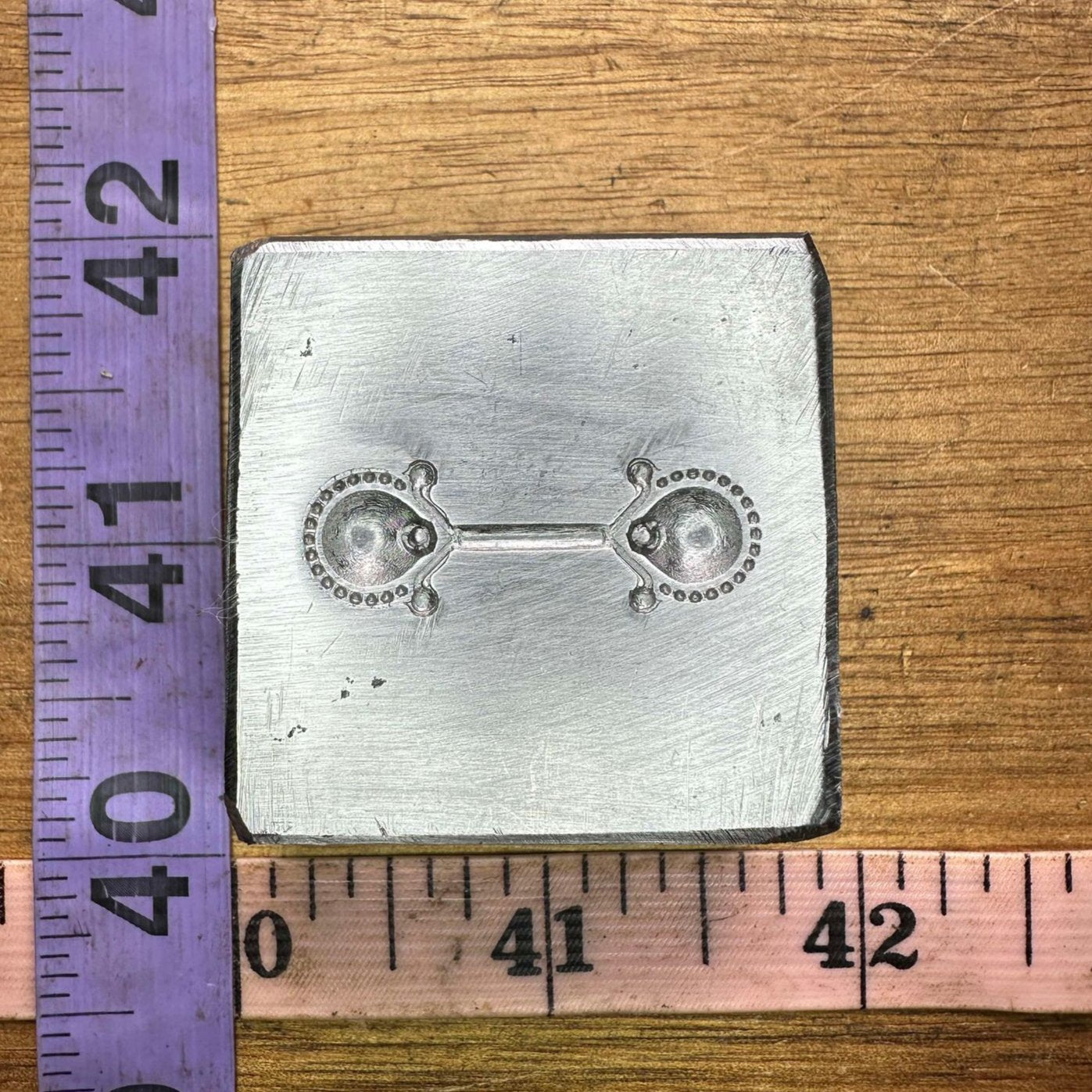 The Bell Maker steel impression die