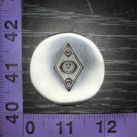 Diamond frame with crescent moon amulet