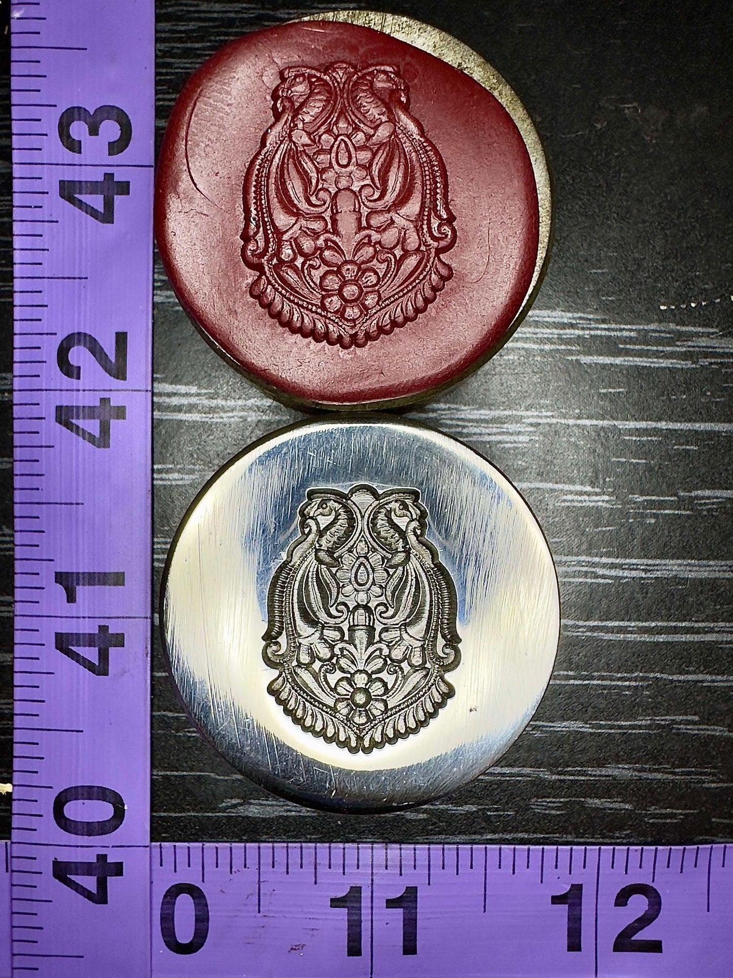 Mirrored peacocks family crest style impression die