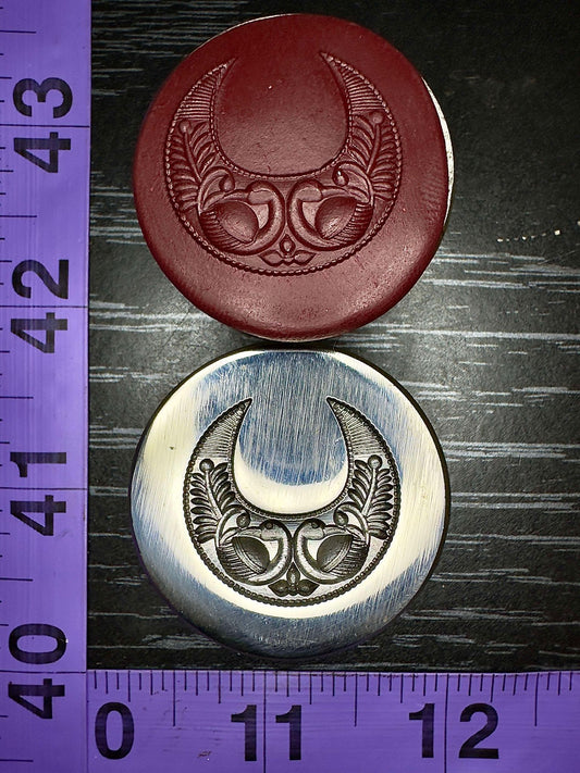 Mirrored peacocks impression die in a crescent moon