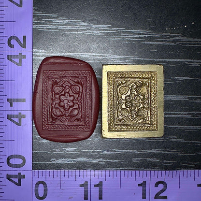 Mirrored peacocks in a stamp sized die